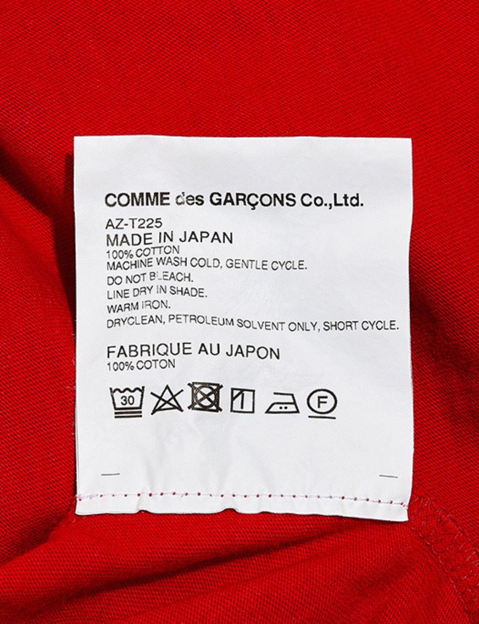 Label kain pada Comme des garcons asli (sumber gambar: realstyle.therealreal.com)