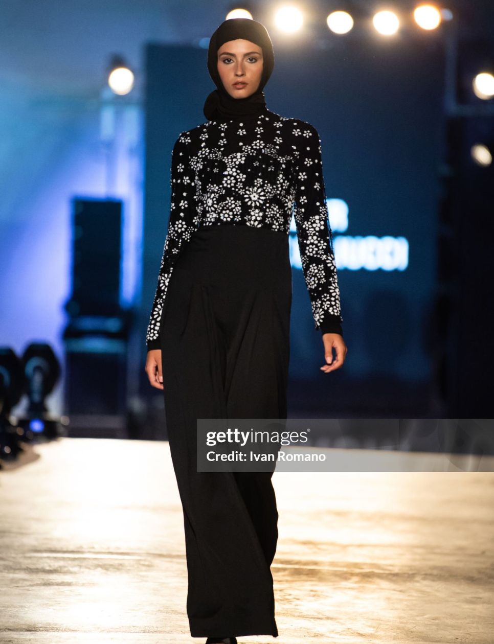 A model walks the runway wearing a dress by Atelier Sorelle Iuliucci during the Evening Dresses Show at Zaha Hadid Maritime Station on September 02, 2021 in Salerno, Italy. (Photo by Ivan Romano/Getty Images)