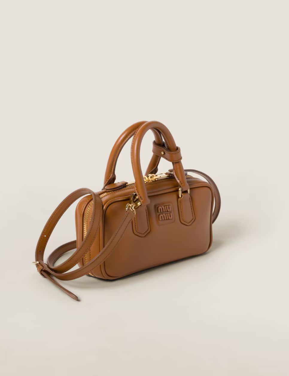 8. Miu Miu Mini Arcade Leather Handbag Cognac