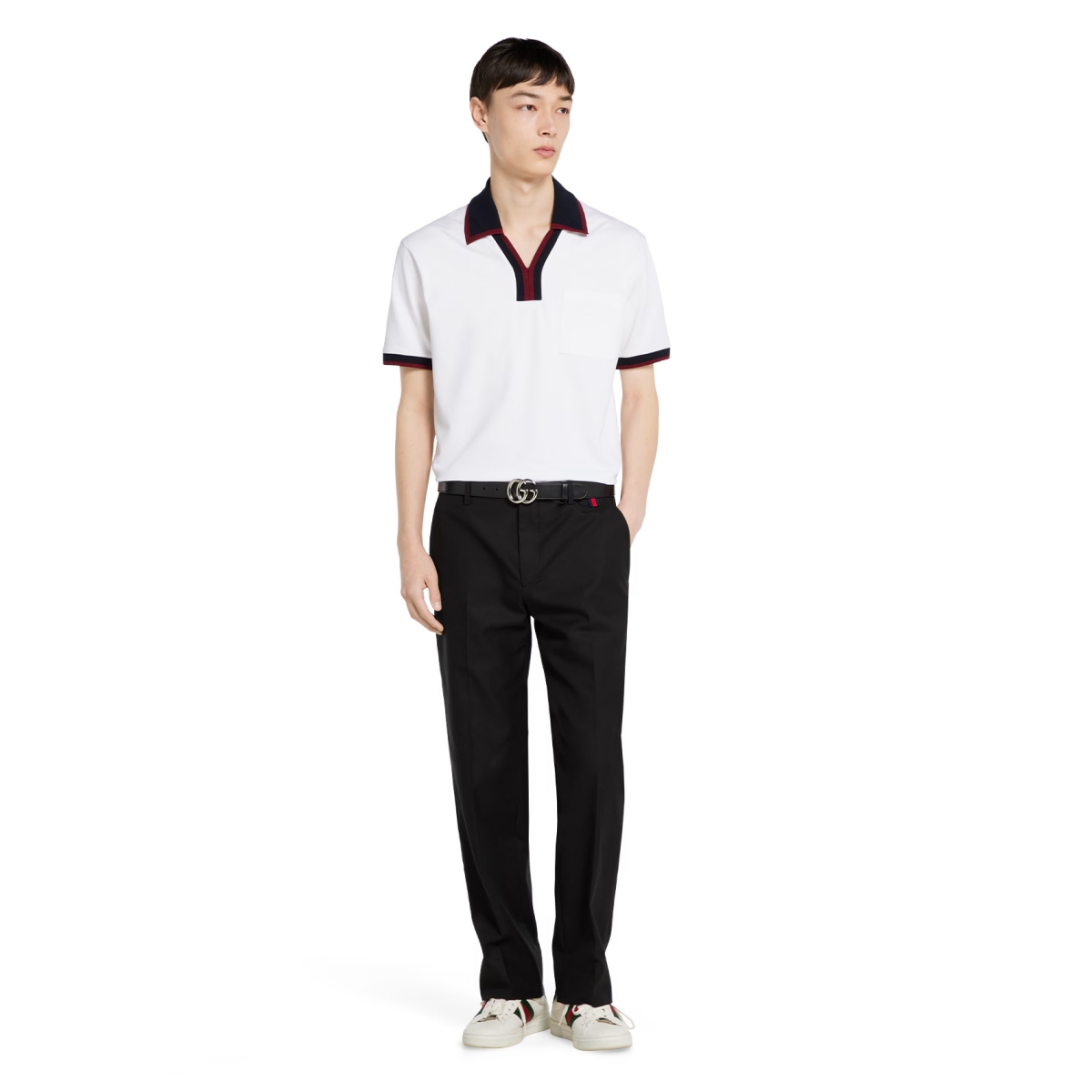 Model mengenakan Cotton piquet polo shirt (Sumber foto: https://www.gucci.com/)