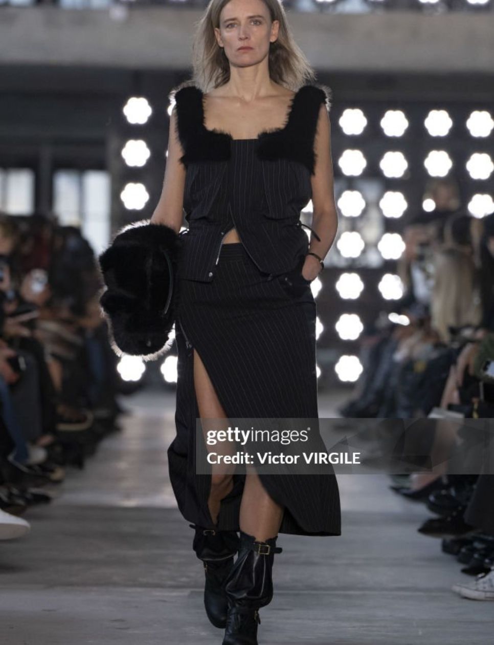Anne Catherine Lacroix walks the runway during the Sacai Ready to Wear Fall/Winter 2025-2026 fashion show as part of the Paris Fashion Week on March 10, 2025 in Paris, France. (Photo by Victor VIRGILE/Gamma-Rapho via Getty Images)