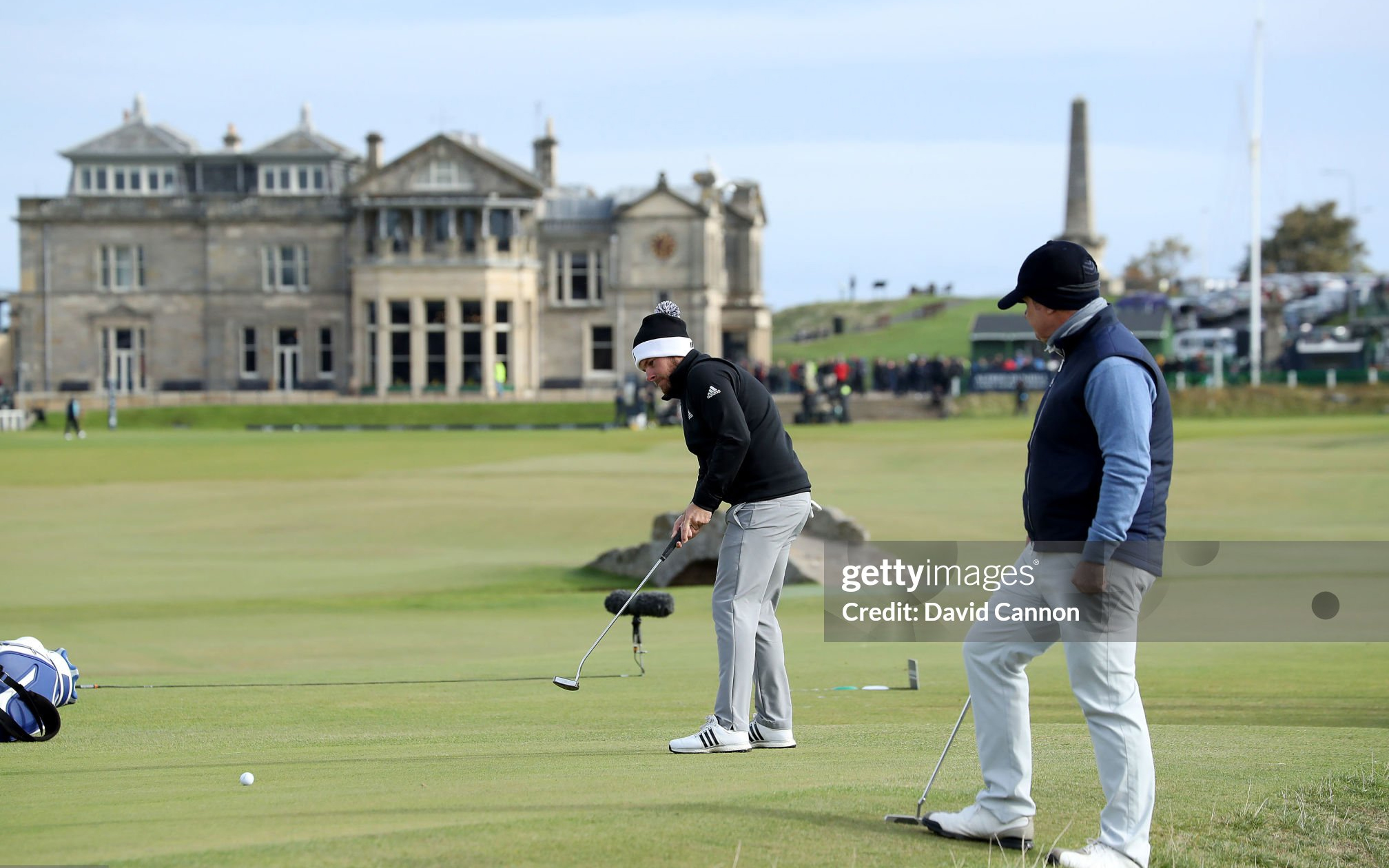 ST ANDREWS, SCOTLAND - OCTOBER 07: Harry Van Dyk the South African businessman the amateur playing partner of Marcus Fraser lwatches Tyrrell Hatton of England hit a long birdie attempt on the 17th green during the final round of the 2018 Alfred Dunhill Links Championship on The Old Course at St Andrews on October 7, 2018 in St Andrews, Scotland. (Photo by David Cannon/Getty Images) Getty Image