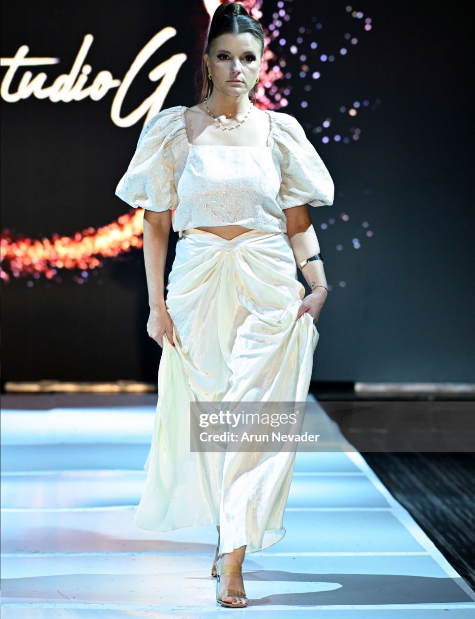 LOS ANGELES, CALIFORNIA - MARCH 22: A model walks the runway during the 'Studio G' fashion show as part of the LA Fashion Closet Showcases International Designers at Academy LA on March 22, 2025 in Los Angeles, California. (Photo by Arun Nevader/Getty Images for LA Fashion Closet) Getty Image