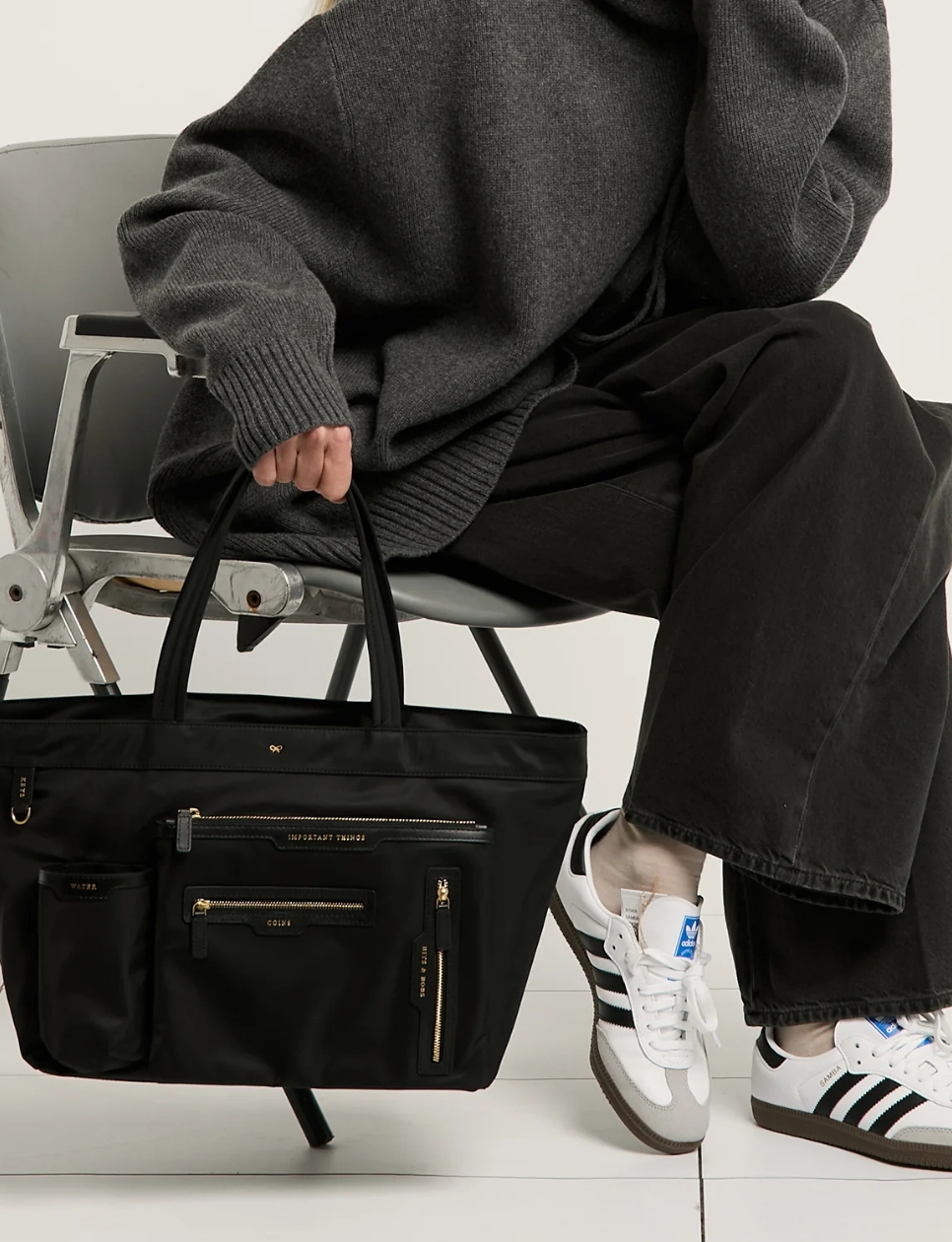 3. Anya Hindmarch E/W Multi Pocket Mini Crossbody Tote Bag Black