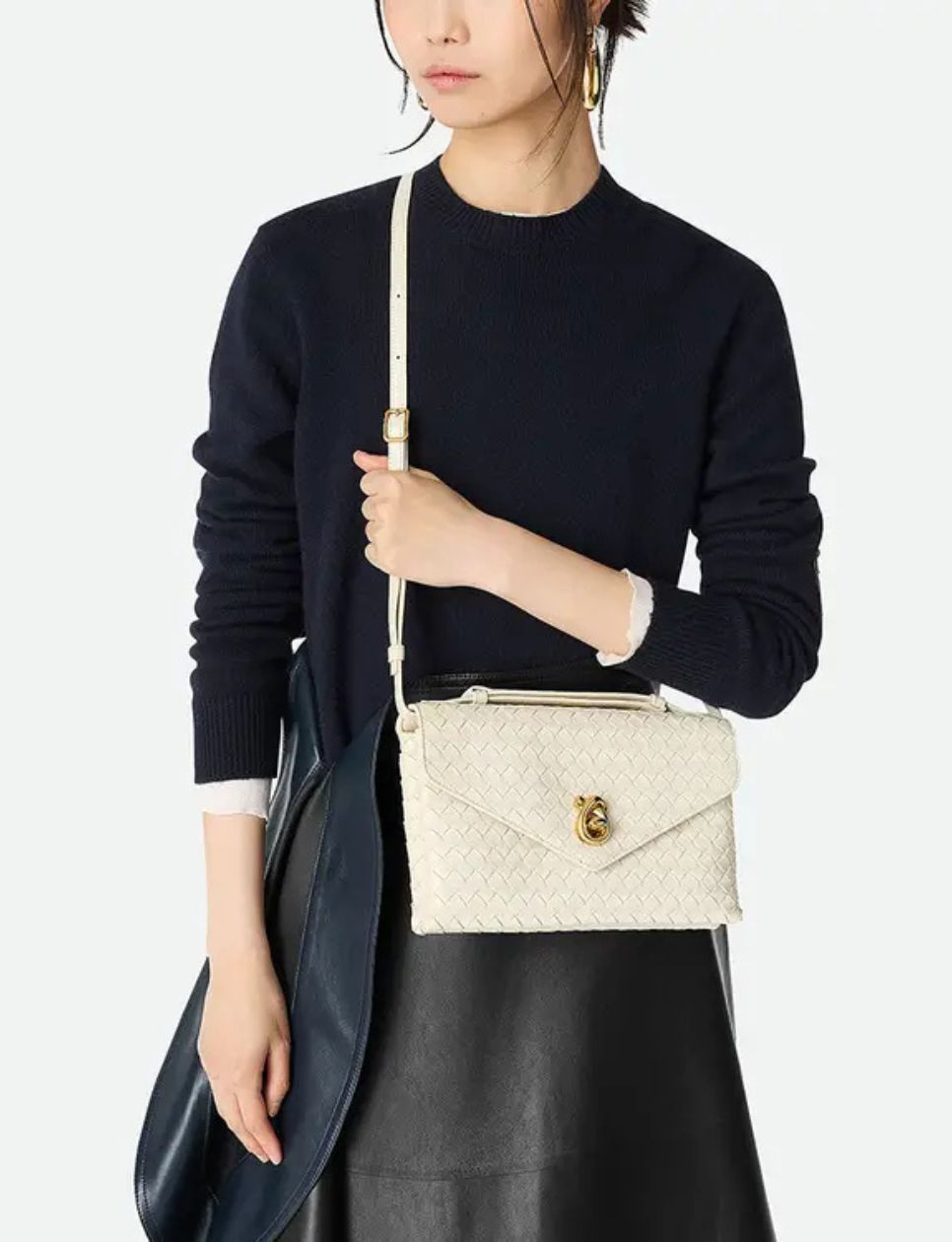 11. Bottega Veneta Knot Lock Intrecciato Leather Crossbody Bag 