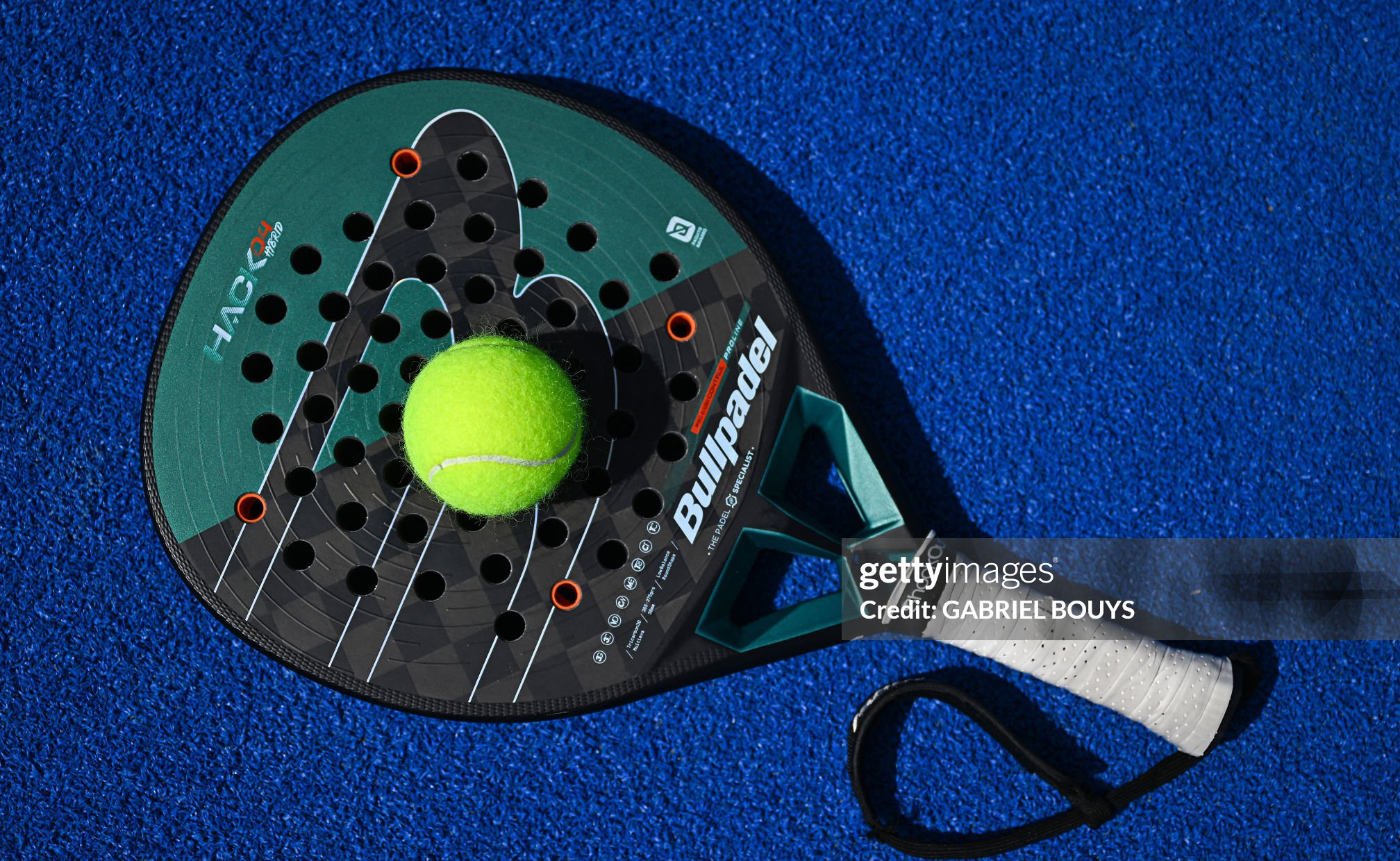 This photograph shows a padel tennis raquet at the Beziers Indoor Padel club in Beziers, southern France on July 22, 2025. The padel, a mixture of tennis and squash, is played in teams of two on a court that is typically surrounded by glass walls which players can bounce balls off. (Photo by GABRIEL BOUYS / AFP) (Photo by GABRIEL BOUYS/AFP via Getty Images)