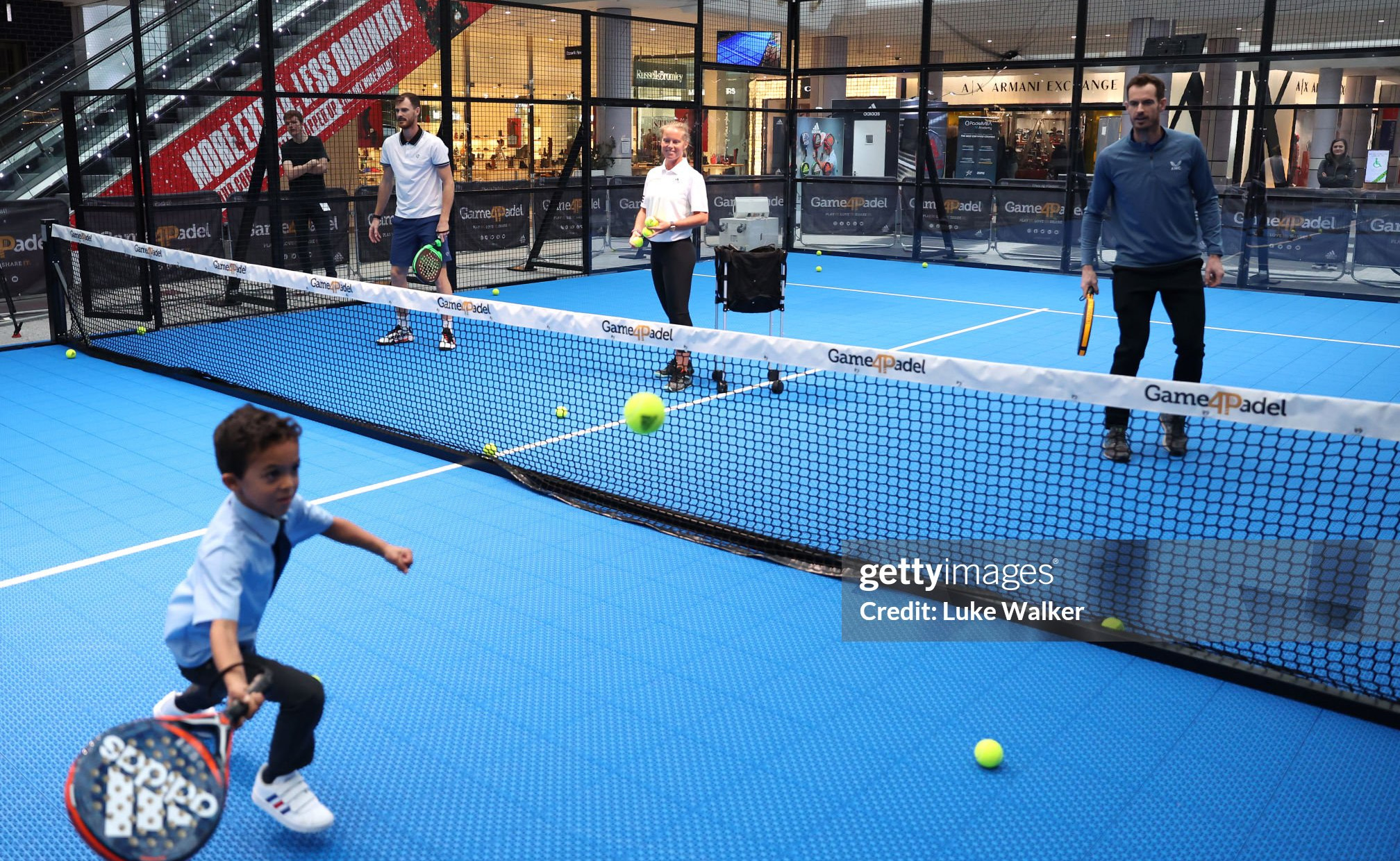 LONDON, ENGLAND - NOVEMBER 07: Andy Murray and Jamie Murray play Padel with local school children at the Game4Padel pop-up event. Game4Padel brings the world's fastest growing sport to Westfield London with a pop-up at Westfield White City on November 07, 2022 in London, England. (Photo by Luke Walker/Getty Images for Game4Padel)