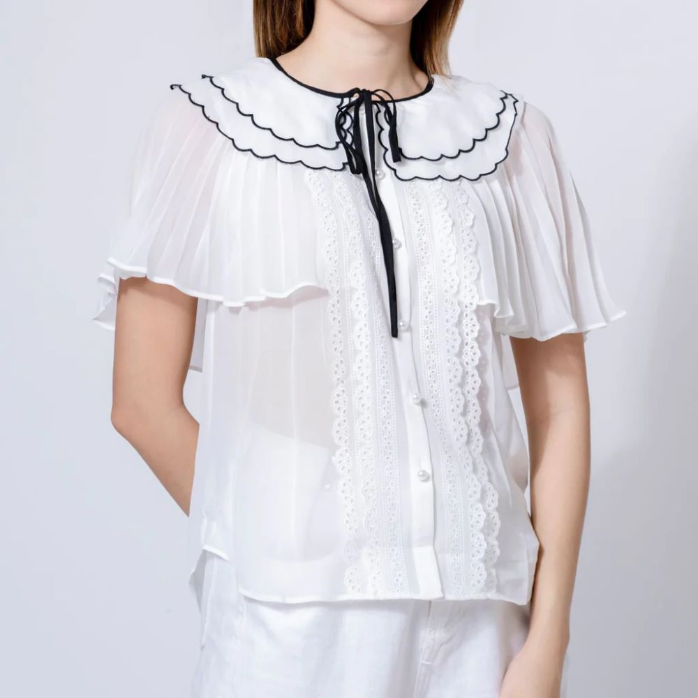 Tambahkan Sentuhan Klasik dan Elegan dengan Kemeja Chiffon Self Portrait Ini